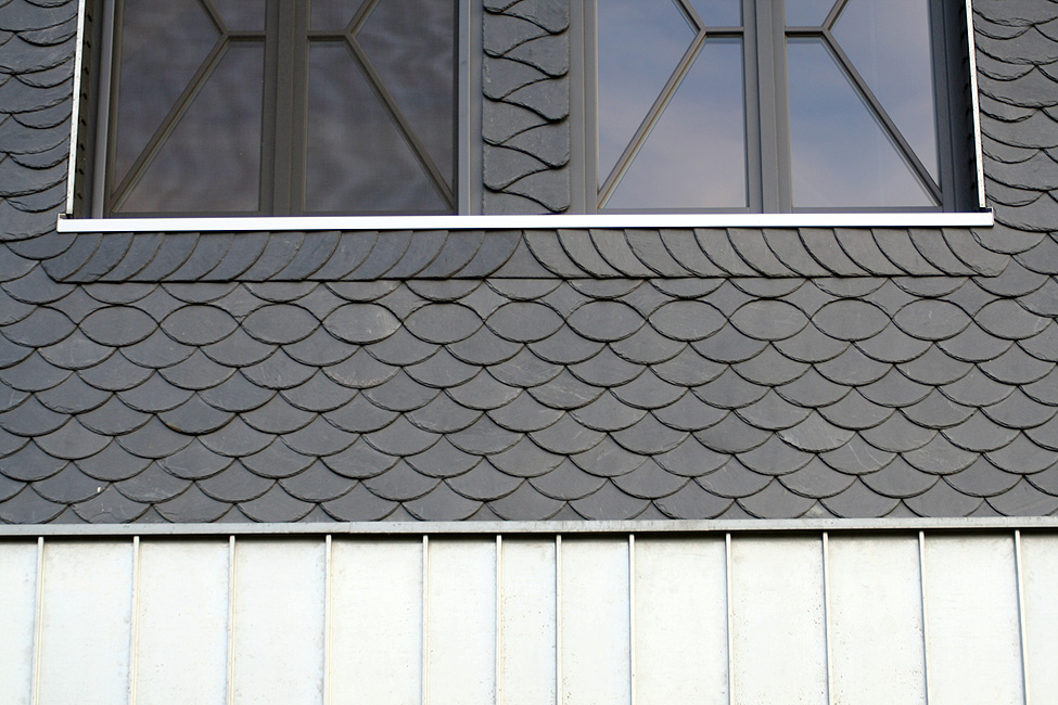 Fassadenverkleidung durch Dachdeckerei Hertwich